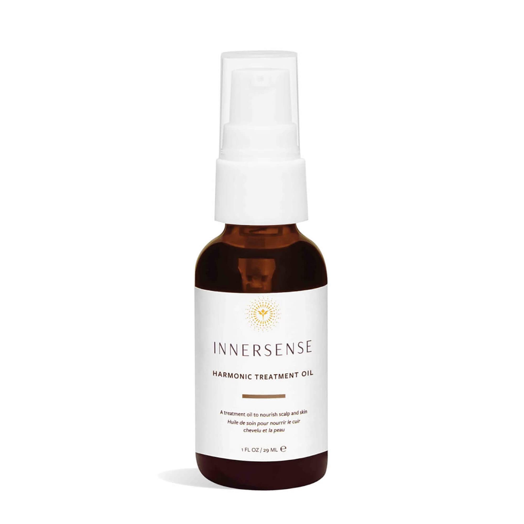 INNERSENSE Natural Harmonic Treatment Oil bottle closeup for hydrated scalp and hair.