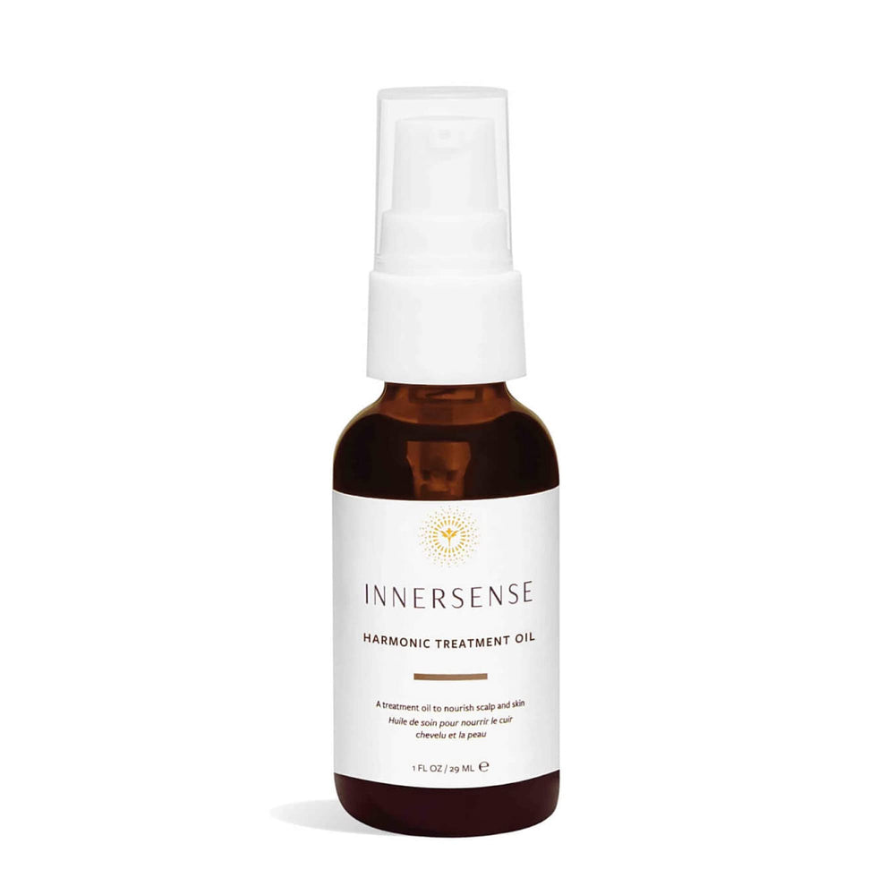 INNERSENSE Natural Harmonic Treatment Oil bottle closeup for hydrated scalp and hair.