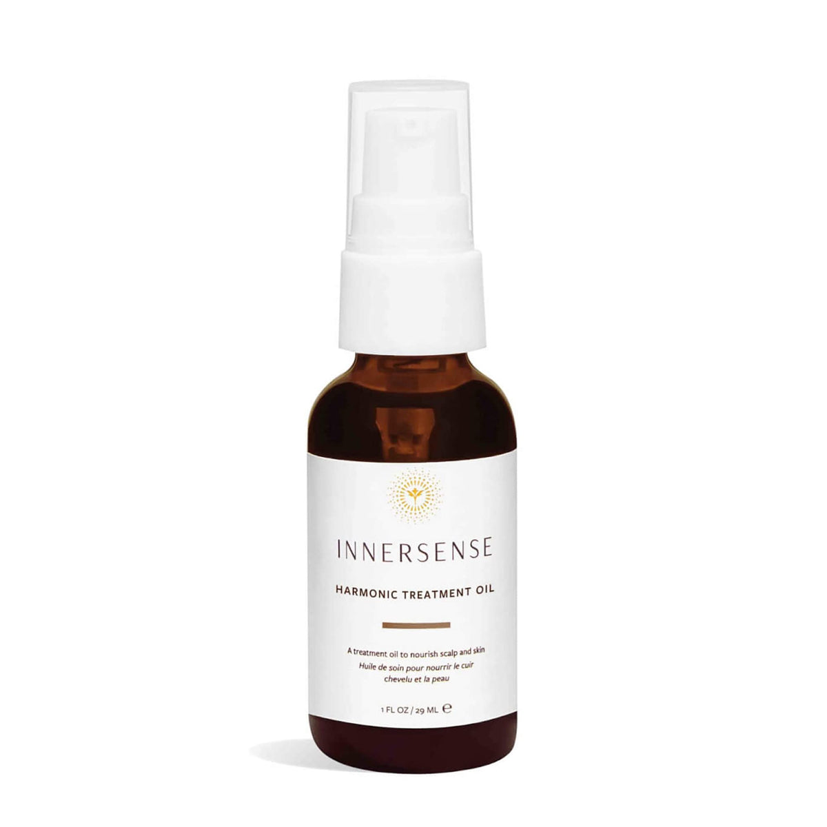 INNERSENSE Natural Harmonic Treatment Oil bottle closeup for hydrated scalp and hair.