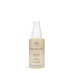 INNERSENSE Renew Scalp Oil bottle pour for easy application and nourished scalp support.