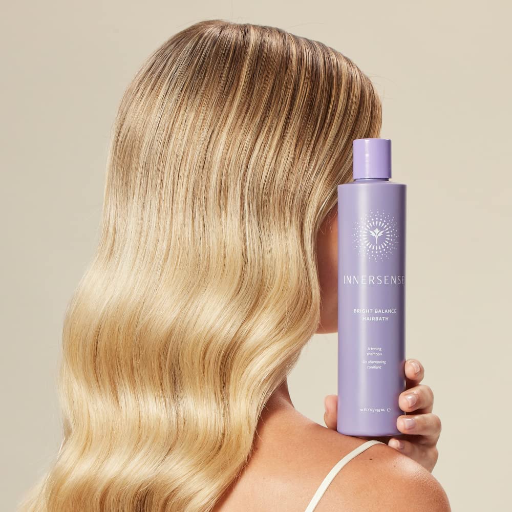 Closeup of INNERSENSE purple-toning shampoo bottle cap and label
