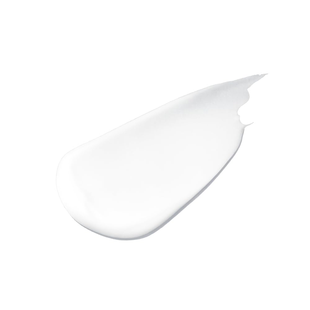 Close-up of INNERSENSE Curl Control cream texture for smooth frizz control.