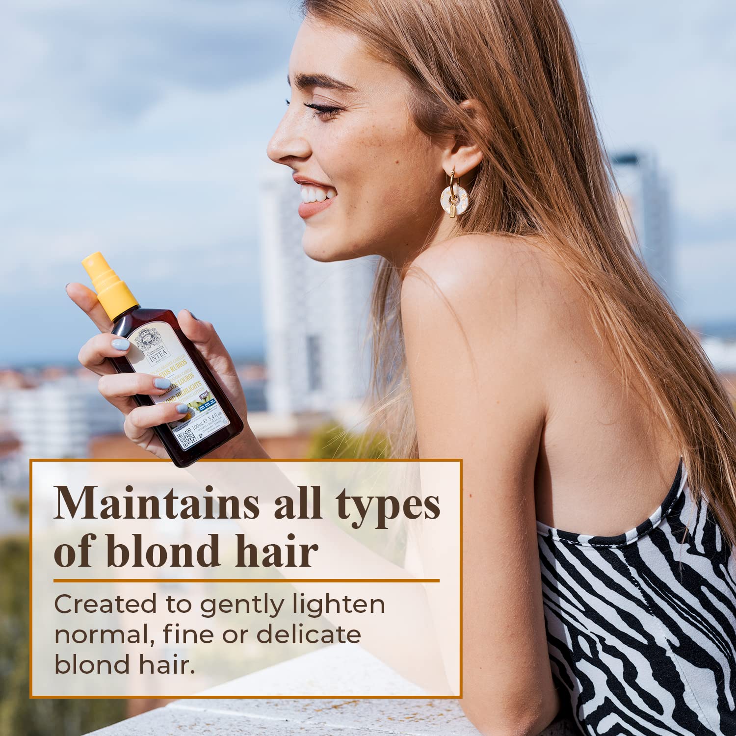 Applying Intea Camomila spray on hair to gradually lighten and blend roots
