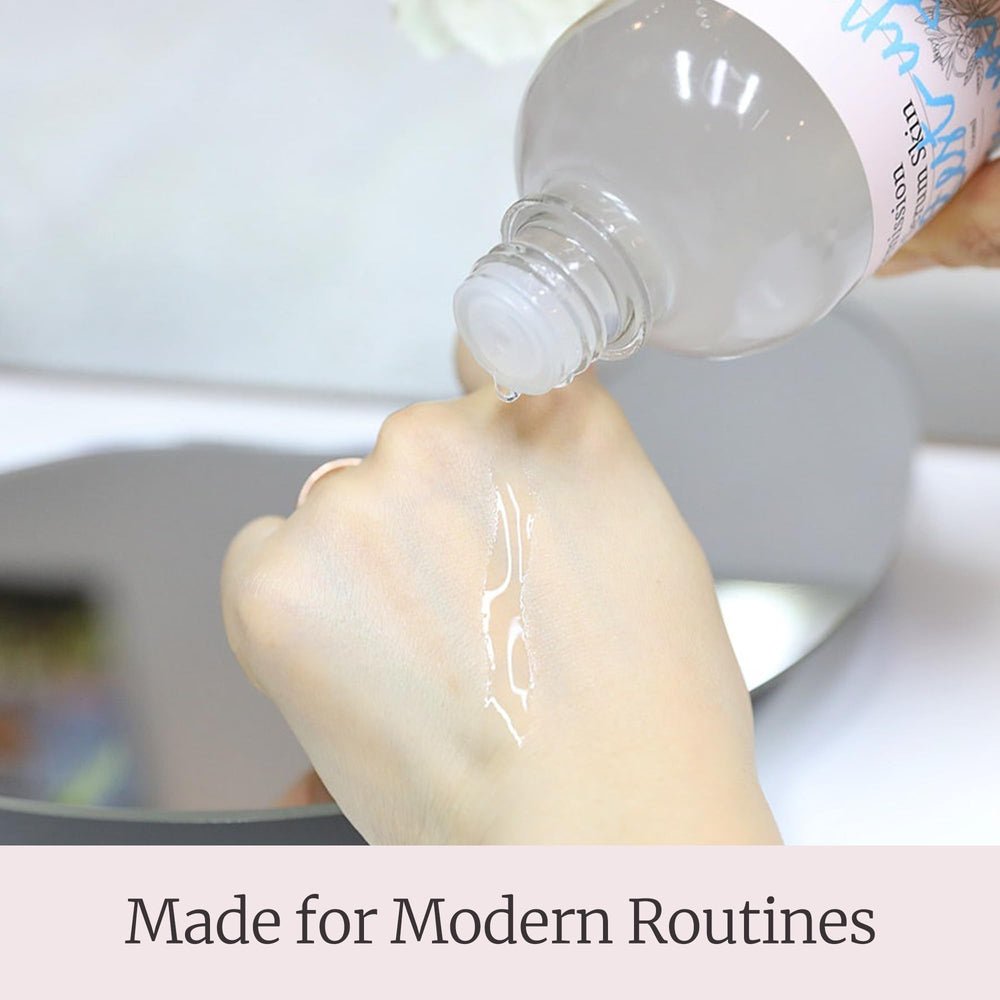 All-in-one skincare moment on clean vanity.