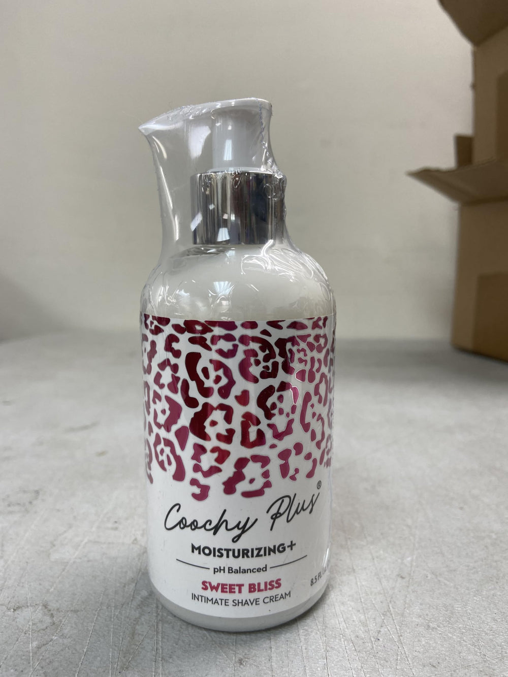 IntiMD Coochy Plus Sweet Bliss close-up shows creamy luster for comfortable shave.