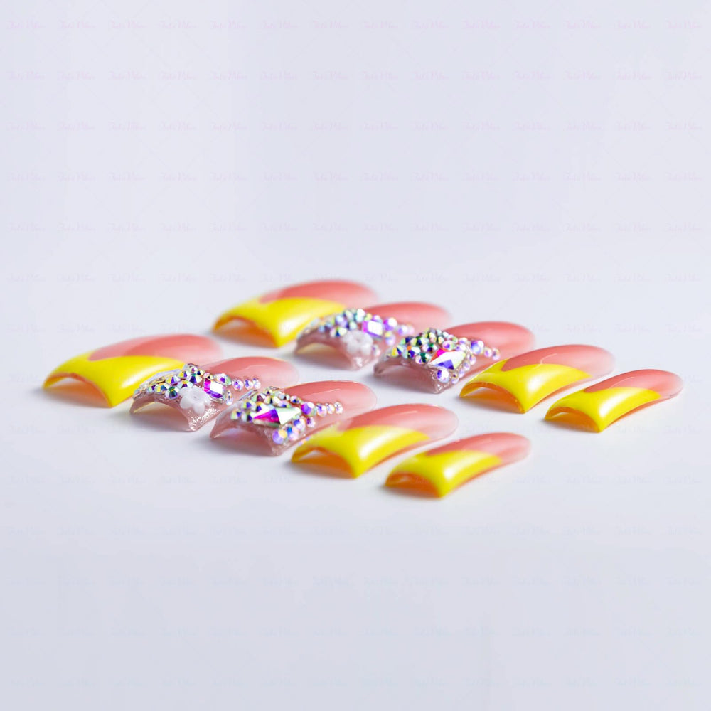 IntoVibes nails with bling rhinestones for festive sparkle and events.