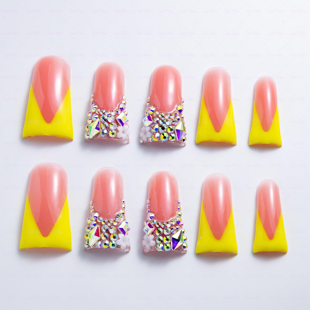 IntoVibes duck-shape nails in yellow gloss for bold party looks.