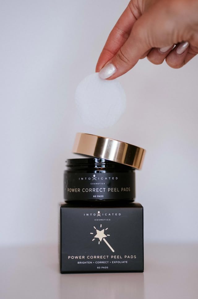 Intoxicated Cosmetics Power Correct Peel Pad bathroom scene for refreshing skin ritual.