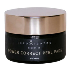 Intoxicated Cosmetics Power Correct Peel Pad bottle for at-home exfoliation and brightening.