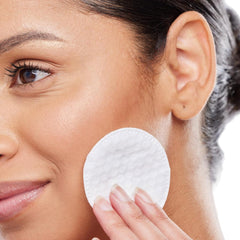 Intrinsics lint-free cotton rounds close-up preventing fiber shedding during removal