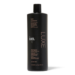 Ion Luxe Shampoo bottle close-up showing premium oil blend.