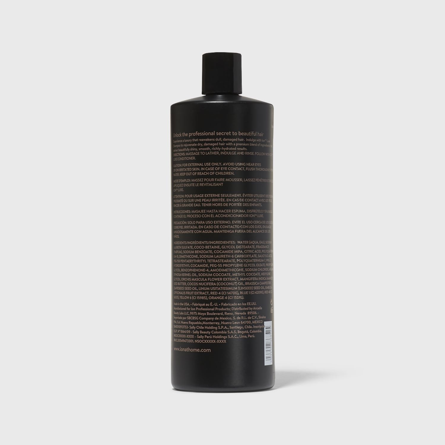 Ion Luxe Shampoo being applied to hair for hydration.