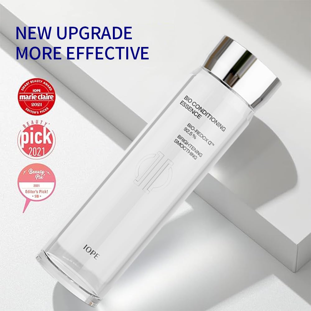 Hands holding IOPE bottle ready for daily hydration routine.