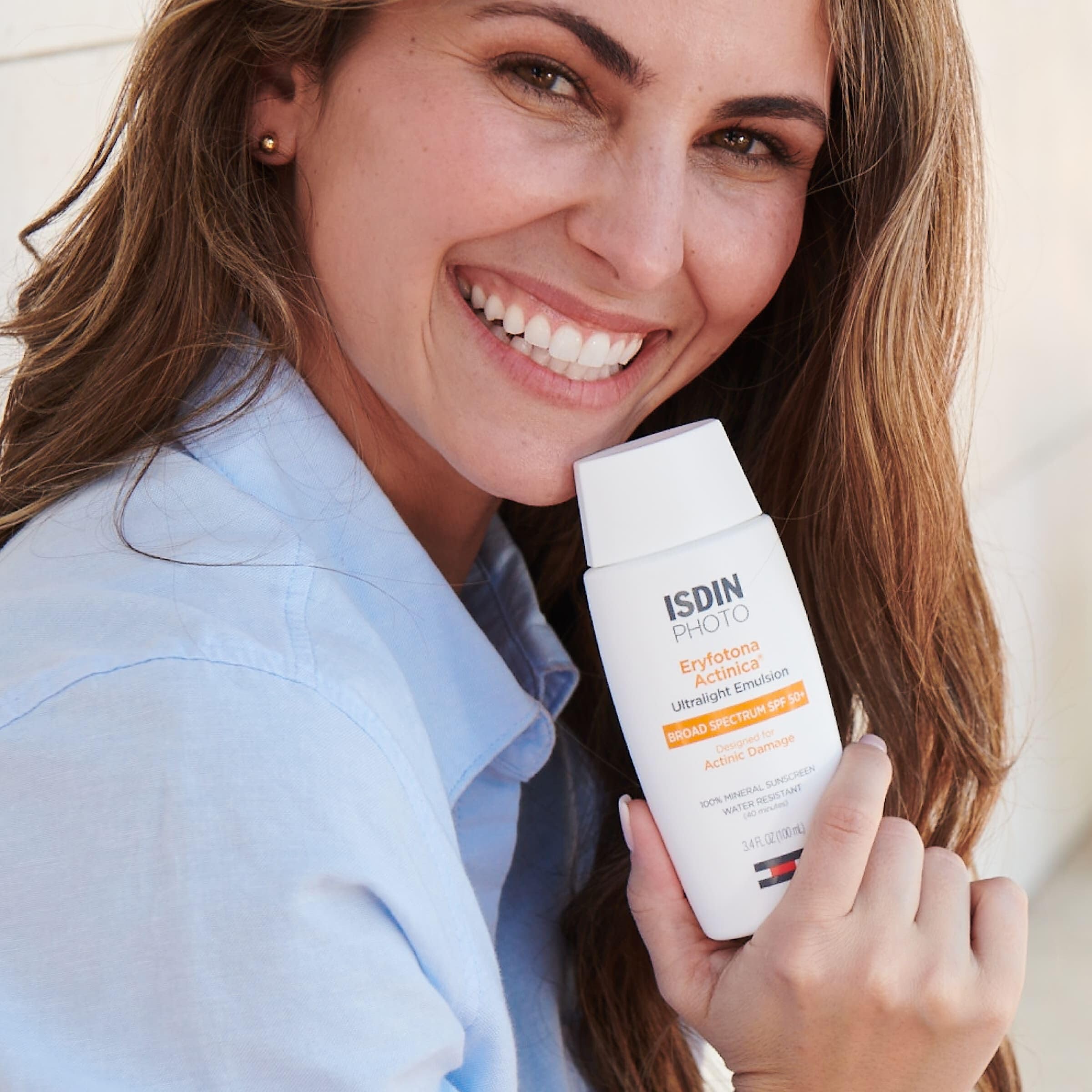ISDIN Eryfotona Actinica bottle with pump illustrating fast-absorbing mineral sunscreen