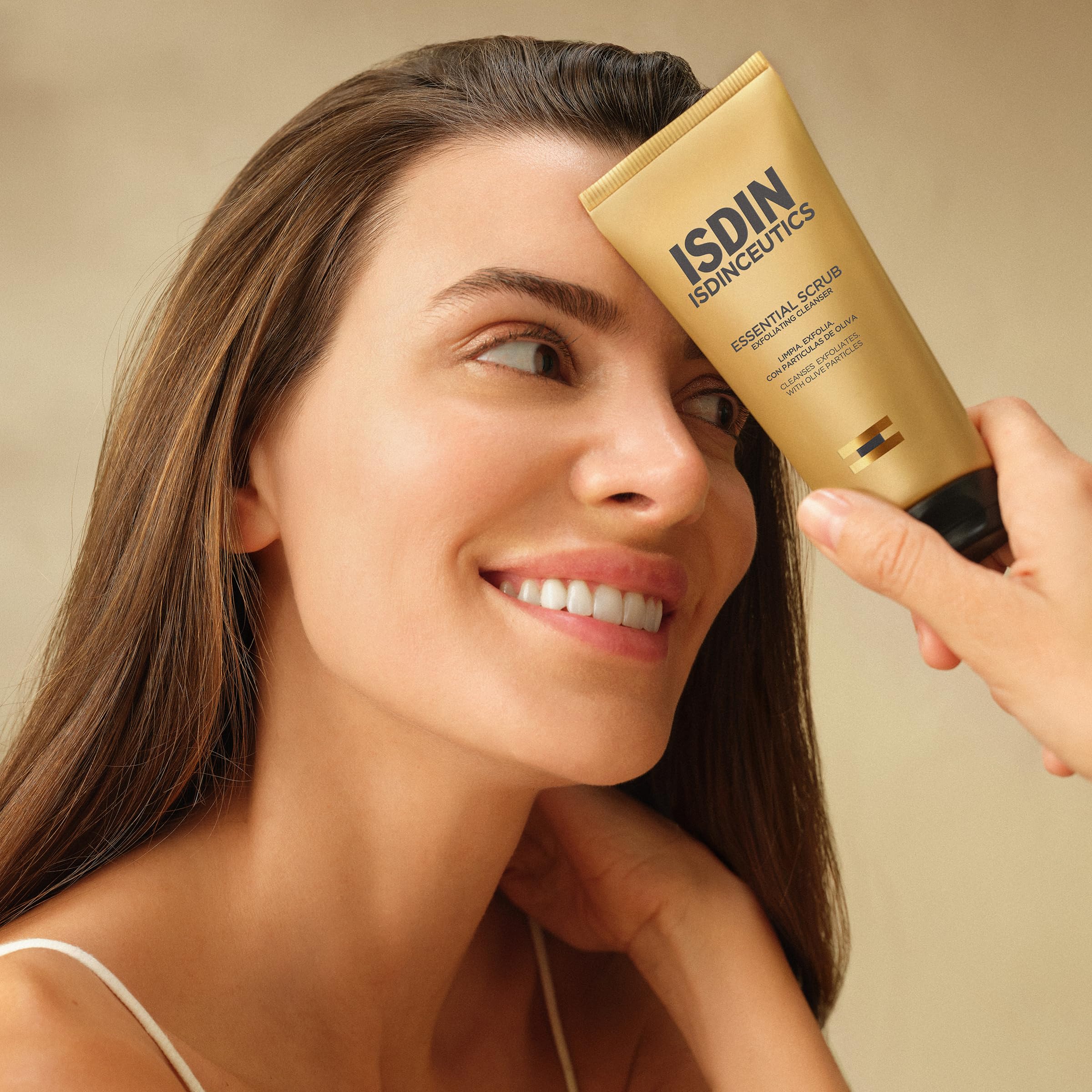 ISDIN Essential Scrub with olive seed particles delivers natural exfoliation for refined pores.