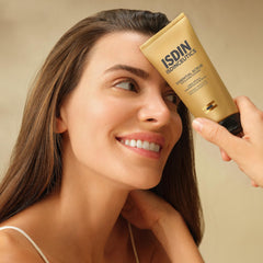 ISDIN Essential Scrub with olive seed particles delivers natural exfoliation for refined pores.