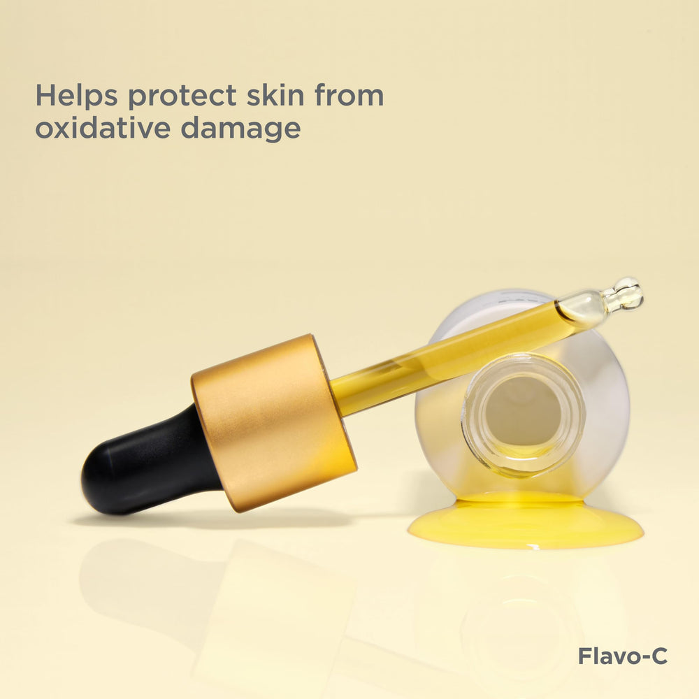 Morning routine with Flavo-C bottle on clean vanity.