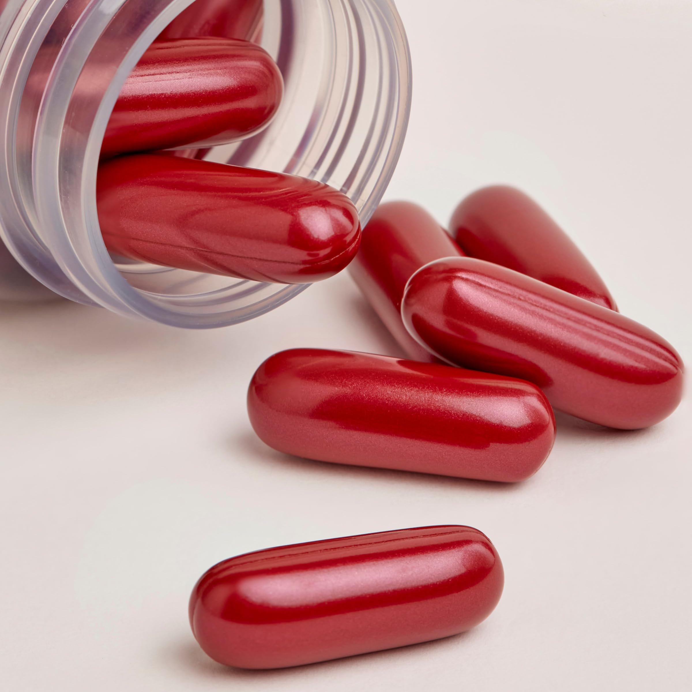 Close-up of Lambdapil capsules for daily use and hair health.