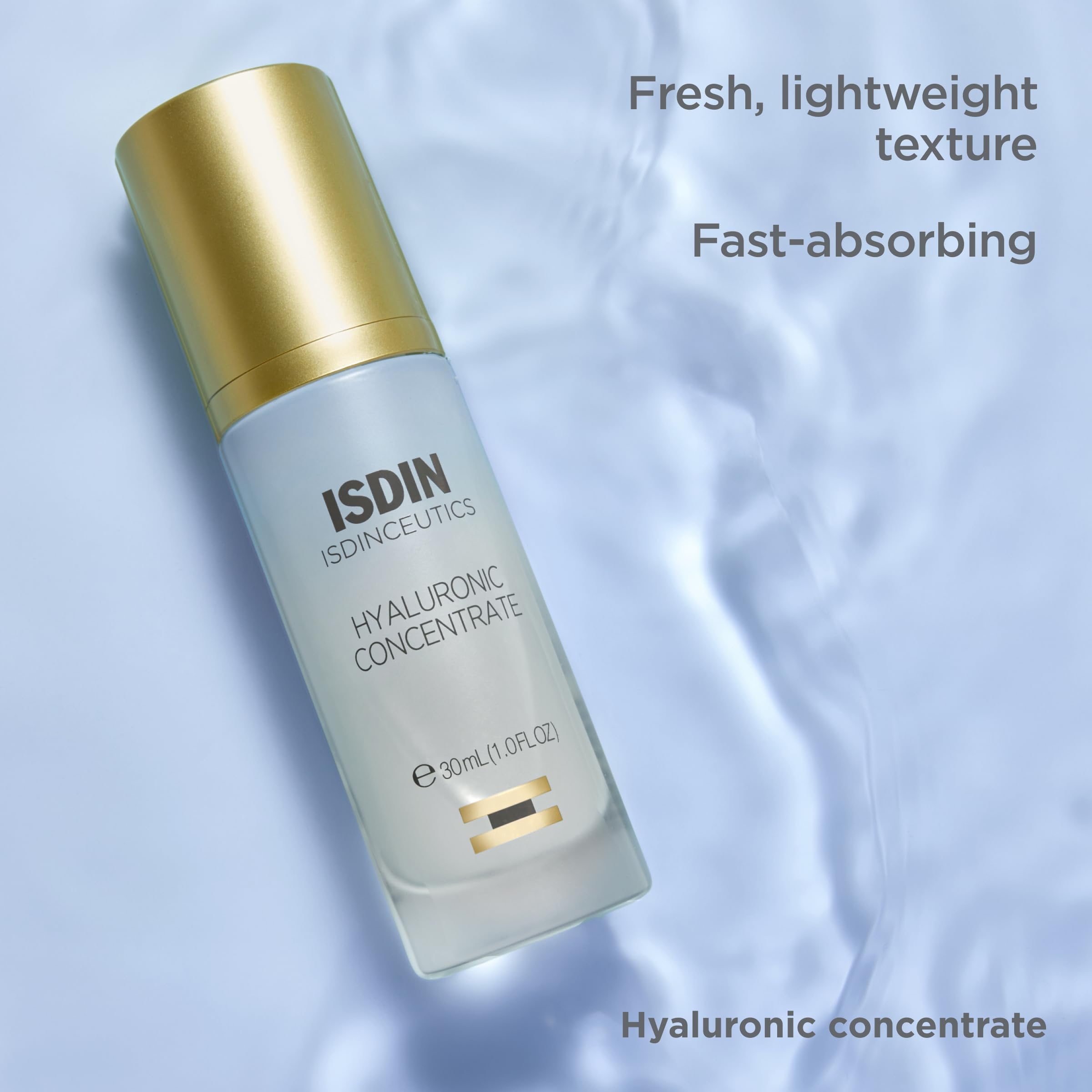 ISDIN Isdinceutics Hyaluronic Concentrate applying to skin for a plump, dewy look.