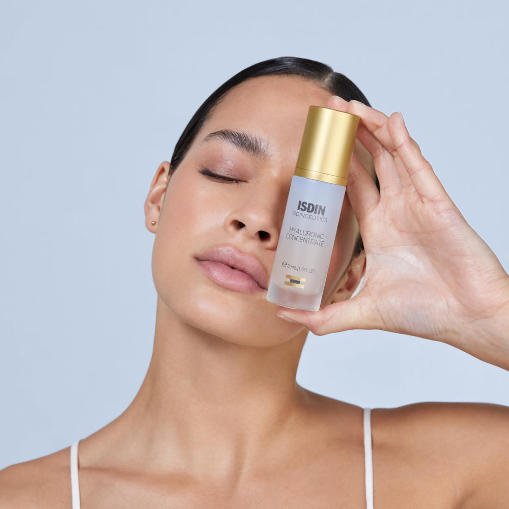 ISDIN Isdinceutics Hyaluronic Concentrate gel texture shown on skin for smoothing.