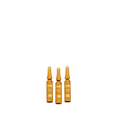 ISDIN Isdinceutics Instant Flash Serum bottle showing premium packaging and a firming impression