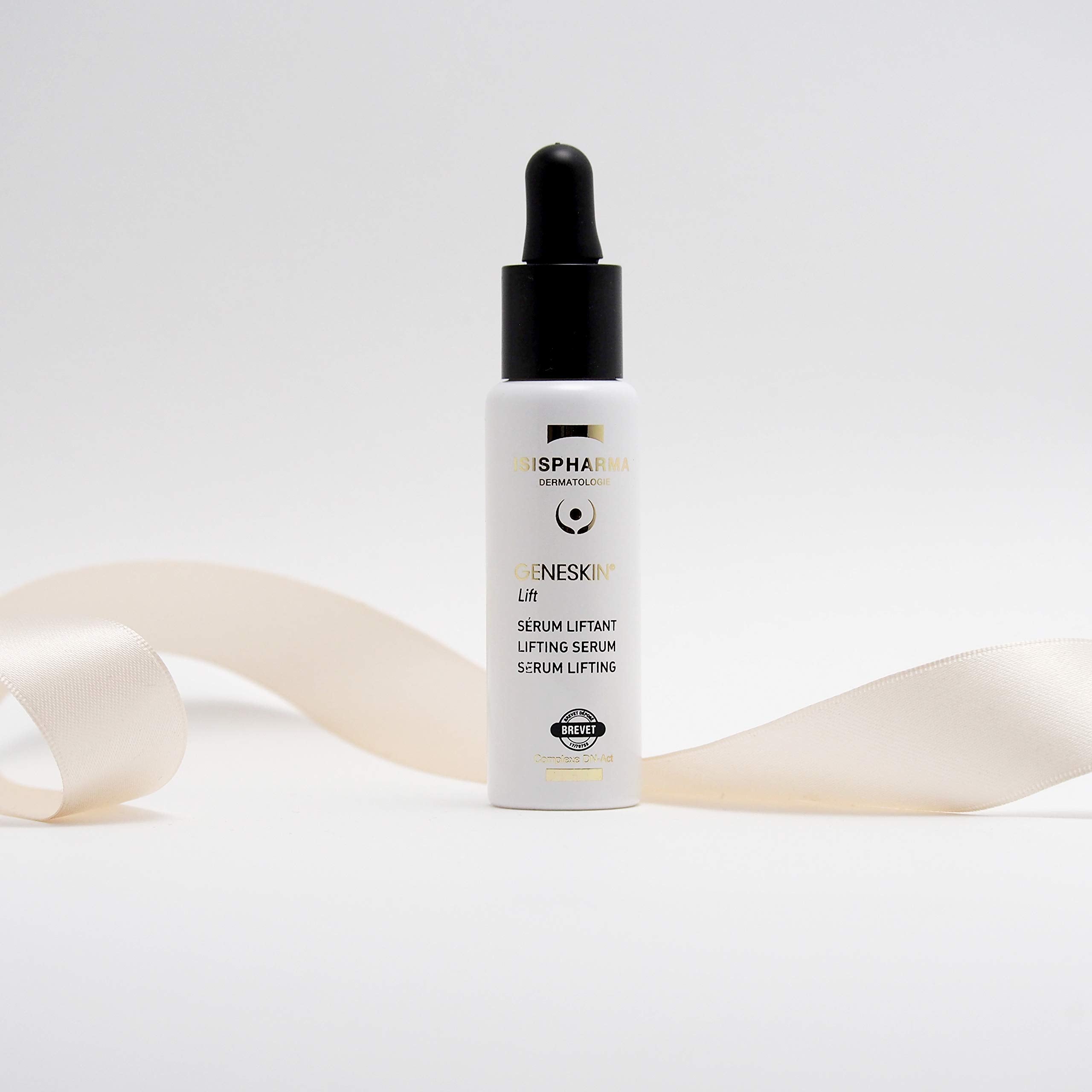 IsisPharma Geneskin Lifting Serum pump dispensing evenly for quick daily use.