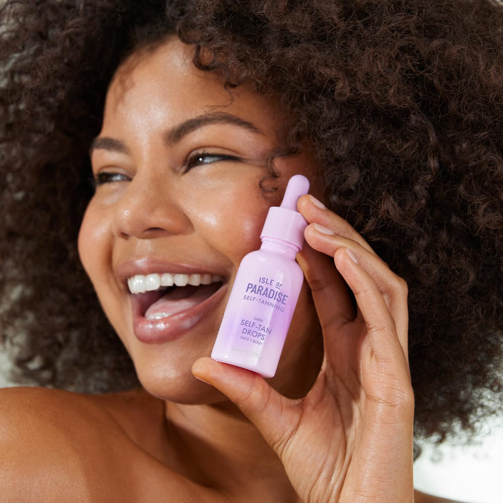 Isle of Paradise self-tanning drops skin swatch showing bronze glow.