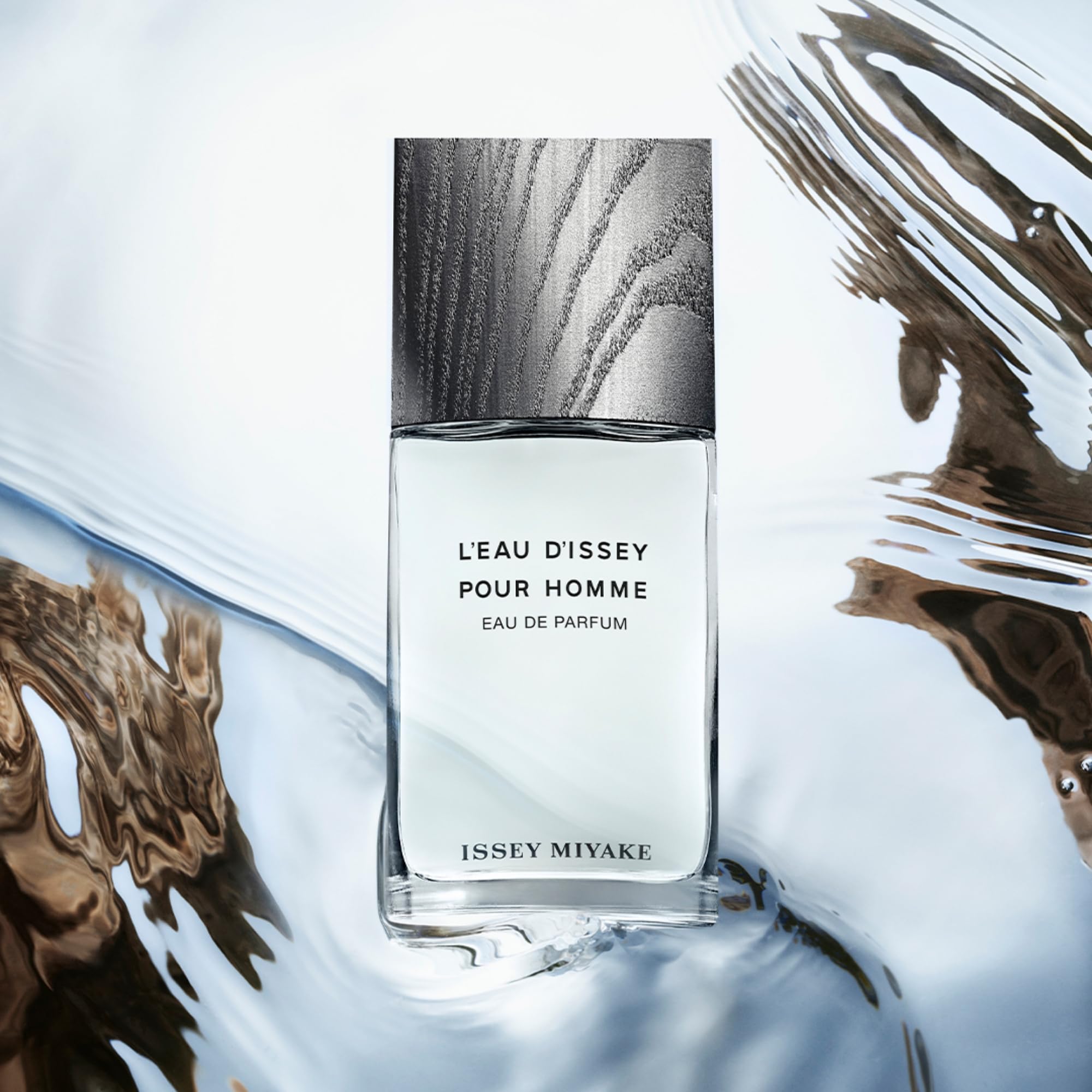 Issey Miyake L'Eau d'Issey Pour Homme's silver finish and wooden cap reflect ocean-inspired design.