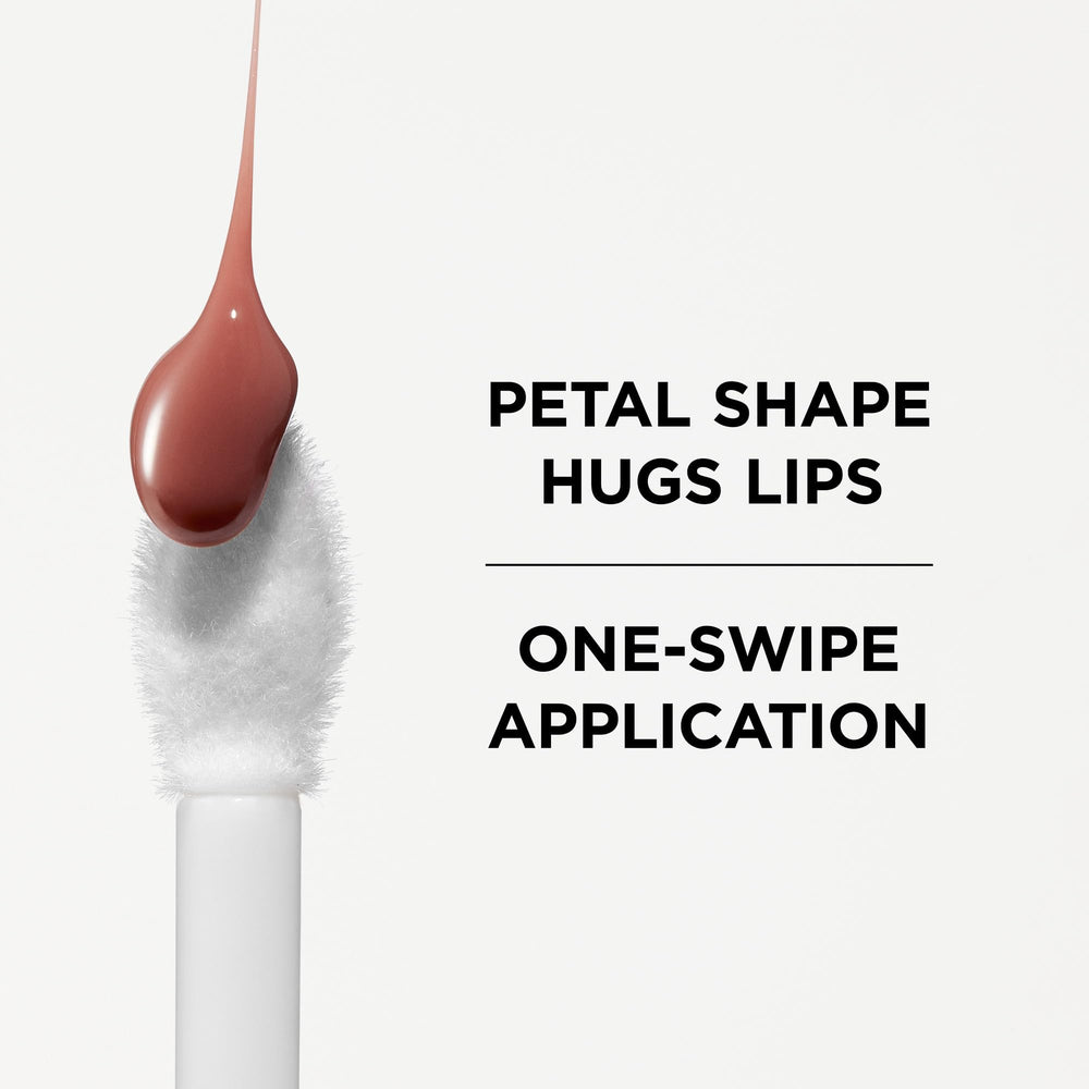 IT Cosmetics Confidence in a Serum Lip Gloss bottle close-up with cap suggesting 8HR hydration.