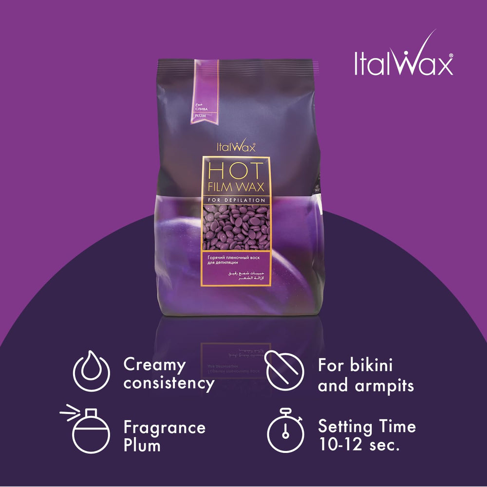 Pouring Italwax Plum hard wax beads to heat for smooth, long-lasting results.
