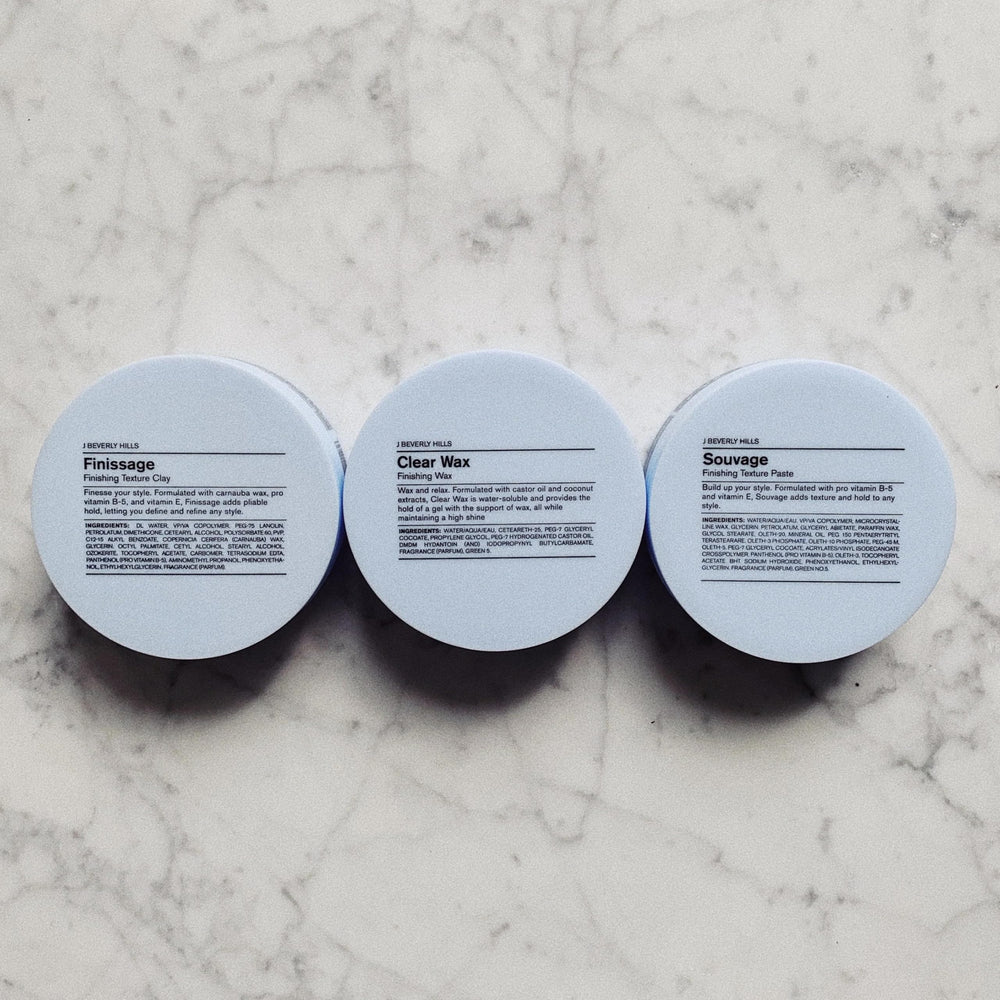 Open jar shows translucent finishing wax ready for styling.