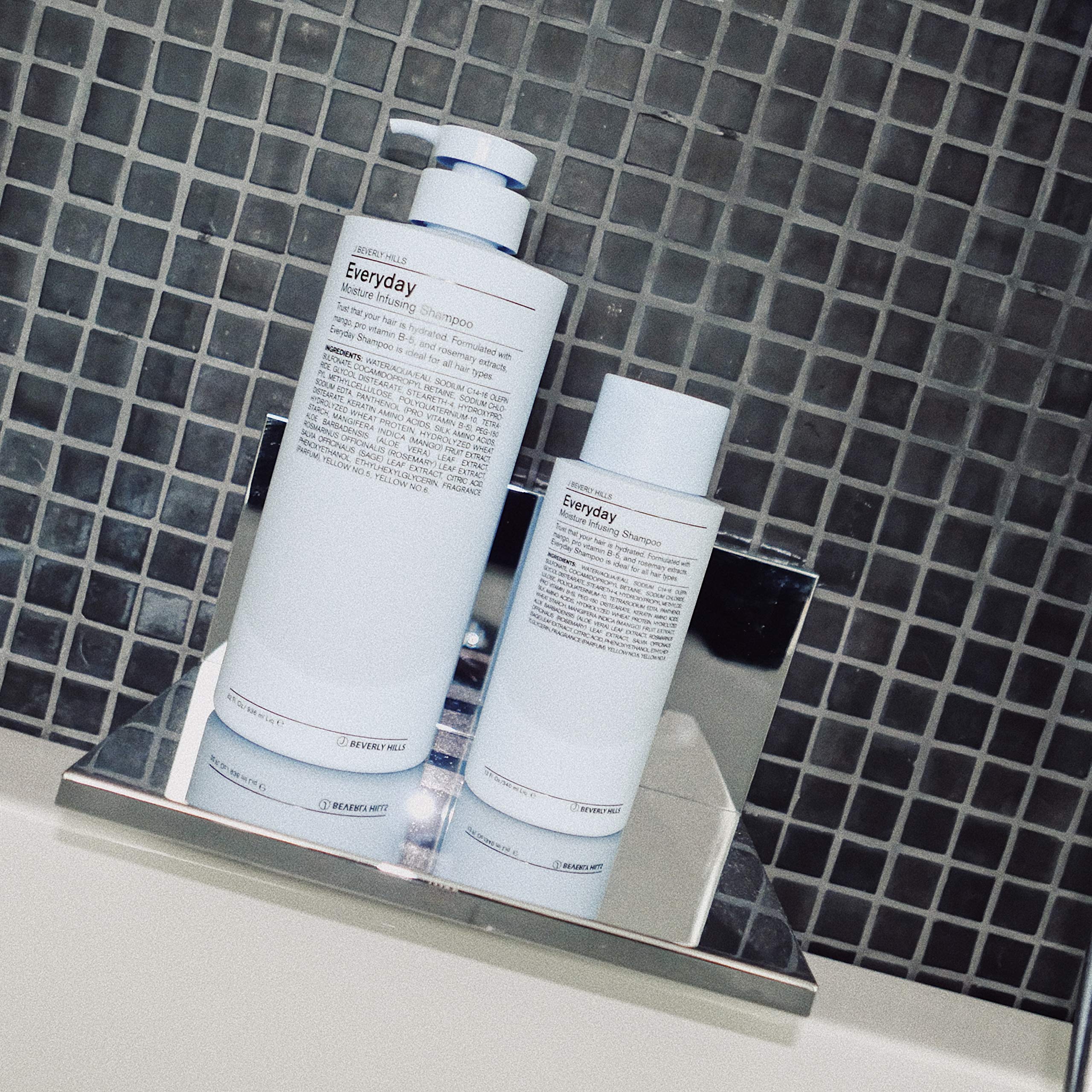 J Beverly Hills Blue Everyday Moisturizing Shampoo label close-up with eucalyptus and mango Pro-V ingredients.