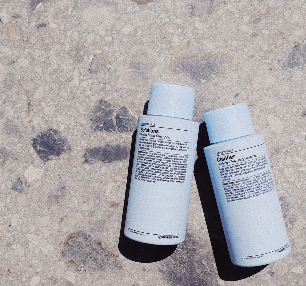 Blue Solutions shampoo lathers through hair with nourishing oils for a gentle cleanse