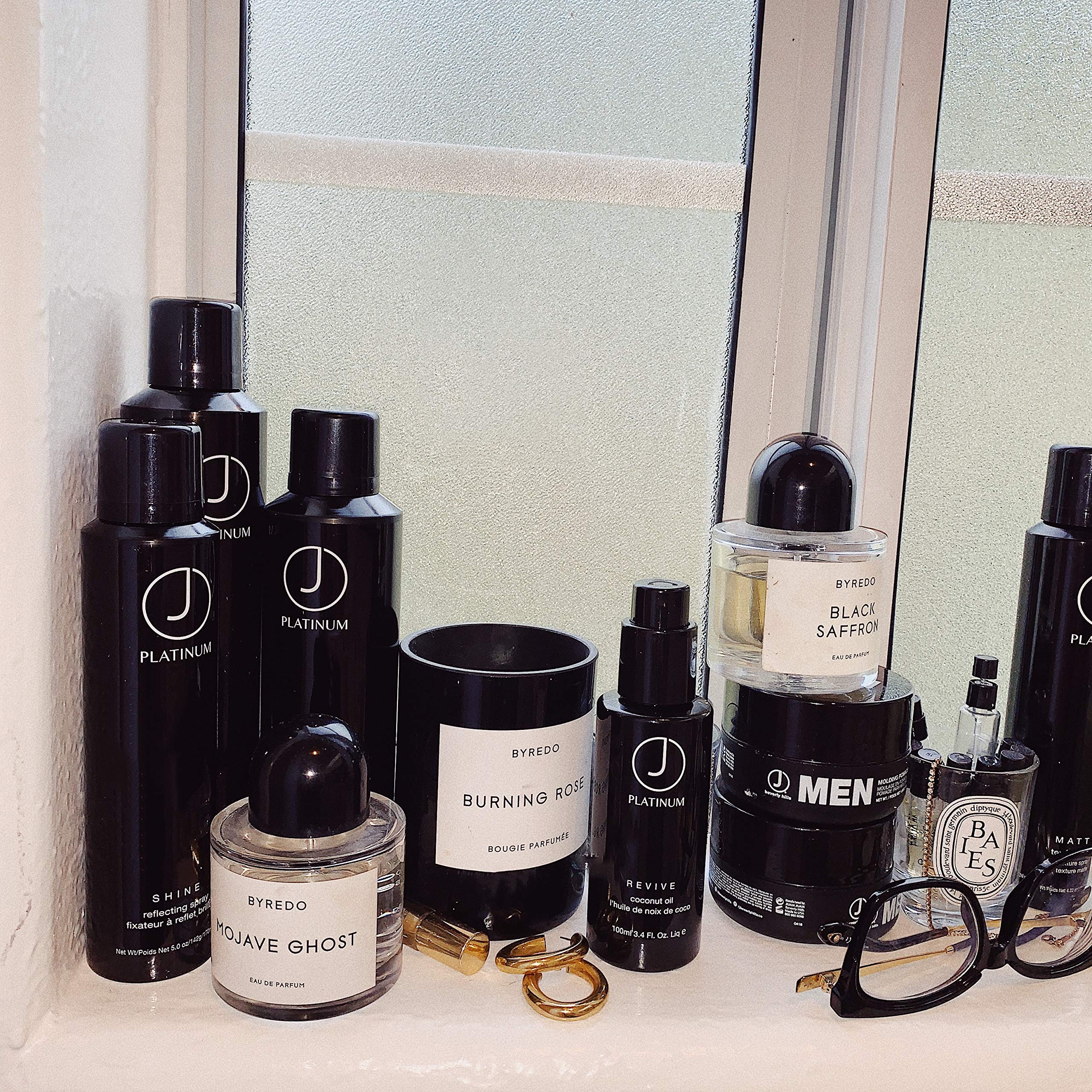 Platinum Revive oil applied to damp hair to lock in moisture