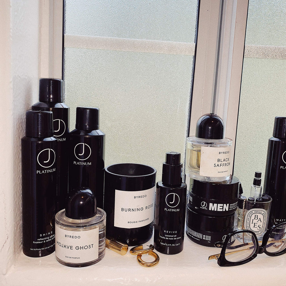Platinum Revive oil applied to damp hair to lock in moisture