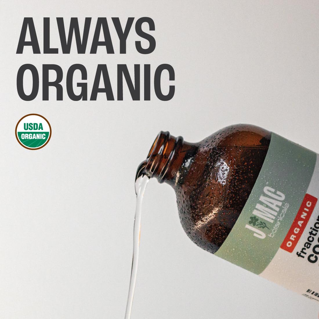 Close-up of the J Mac Botanicals Organic Fractionated Coconut Oil label showing certified organic status