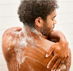 Body-wash scene emphasizing refreshing citrus-mint scent