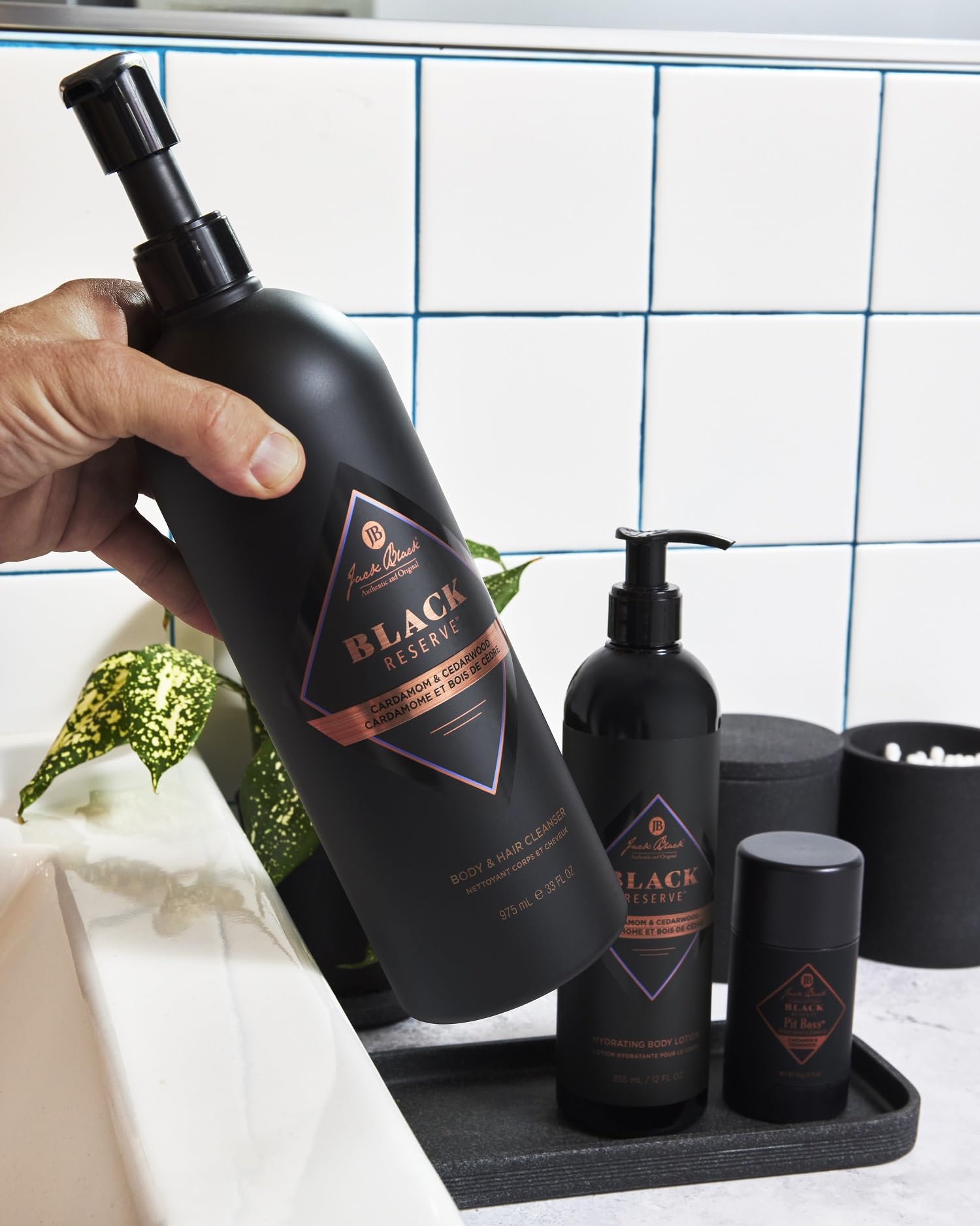 Jack Black scent layering steps graphic suggests maximizing fragrance with three products