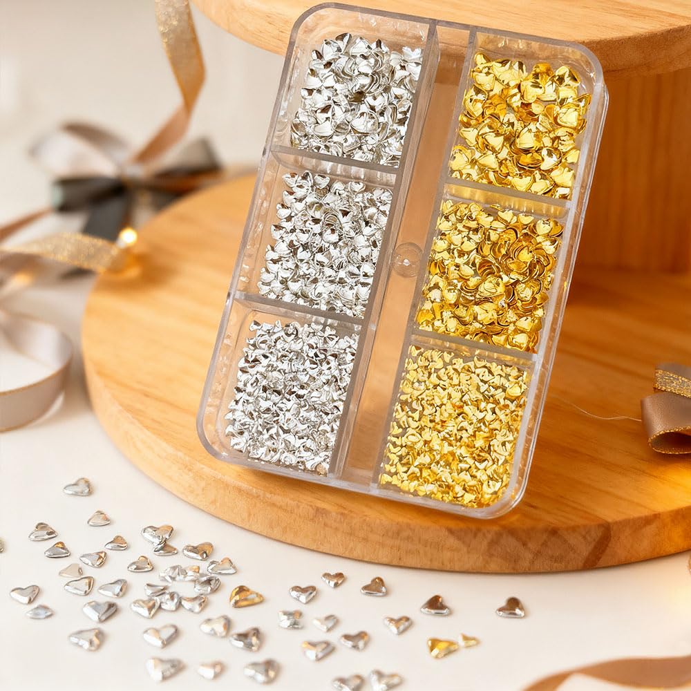 Jaliya silver 2-5mm heart stud adds refined metallic flair to nails.