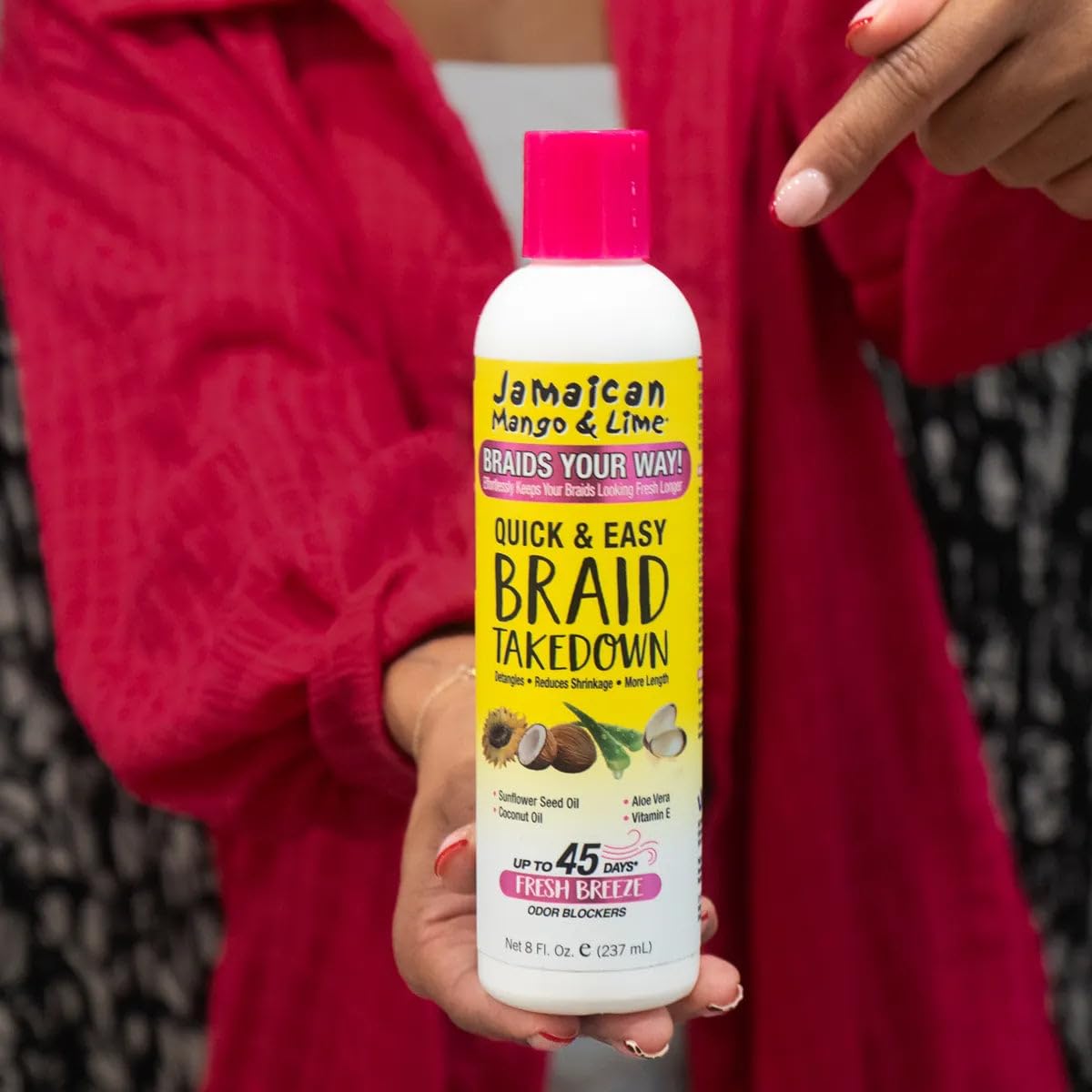 Jamaican Mango & Lime build-up loosening lotion for cleaner post-takdown hair.