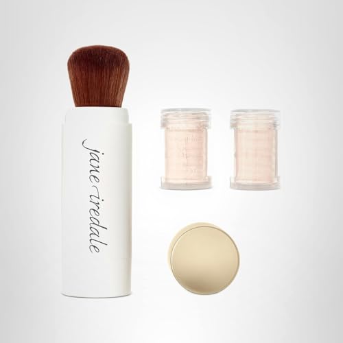 Jane Iredale Powder-Me SPF 30 brush protects scalp during outdoor activities.