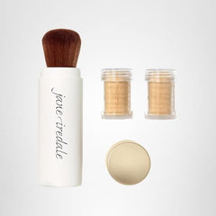 Jane Iredale Powder-Me SPF 30 in tanned shade blends naturally for a seamless finish.