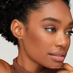 Jane Iredale PureBronze Matte Bronzer compact open, showcasing refill-friendly design for less waste.