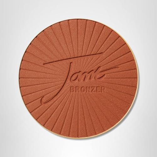 Jane Iredale PureBronze Matte Bronzer on cheeks and jaw for balanced warmth.