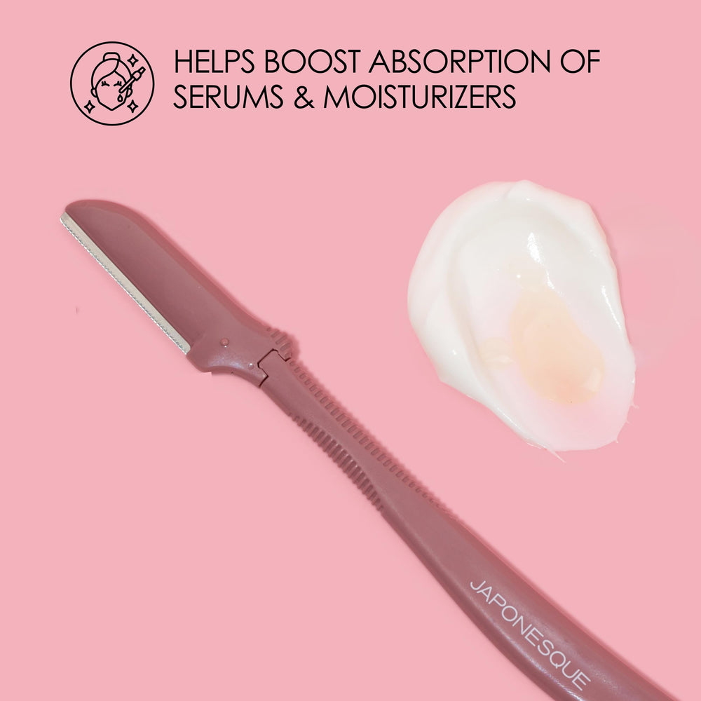 JAPONESQUE dermaplaner removing peach fuzz on cheeks for smoother makeup base.