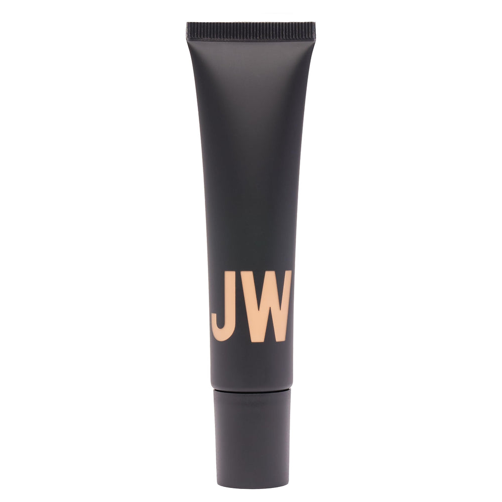 Jason Wu Tinted Moisturizer with Vitamin B3 and Vitamin E nourishes skin.