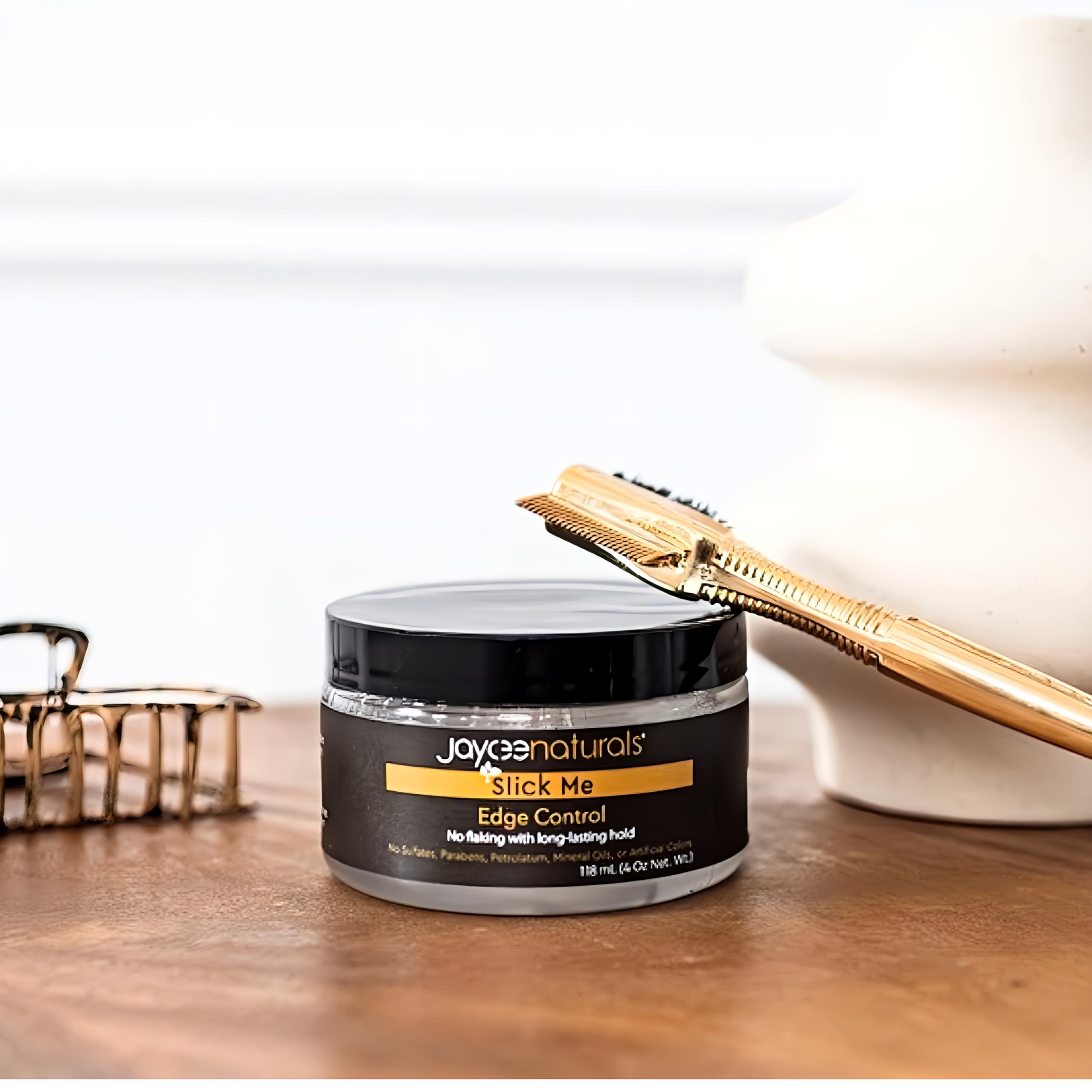 Non-drying and protective edge control by Jaycee Naturals Slick Me Edge Control.