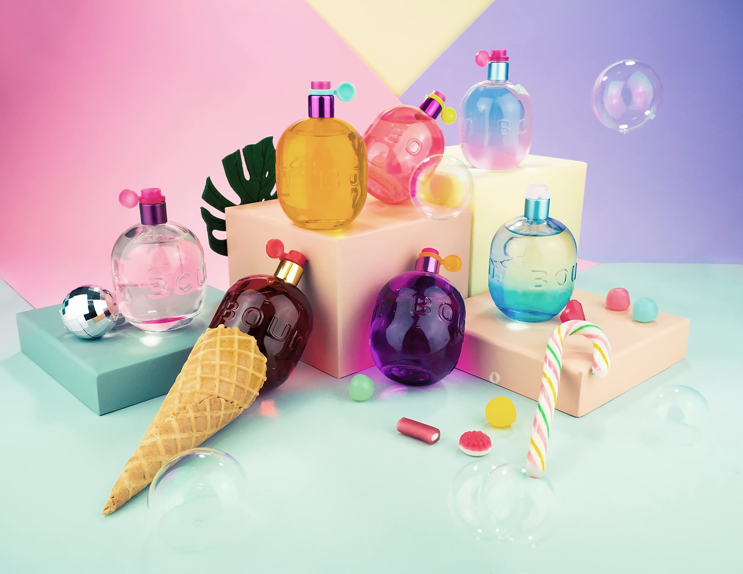 Jeanne Arthes Boum Rainbow bottle stands out on shelf.