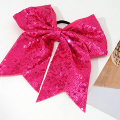 Jeffan sequin bow close up highlights craftsmanship and sparkle