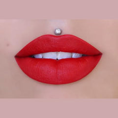 Jeffree Star Velour Redrum swatch showing bold matte red finish